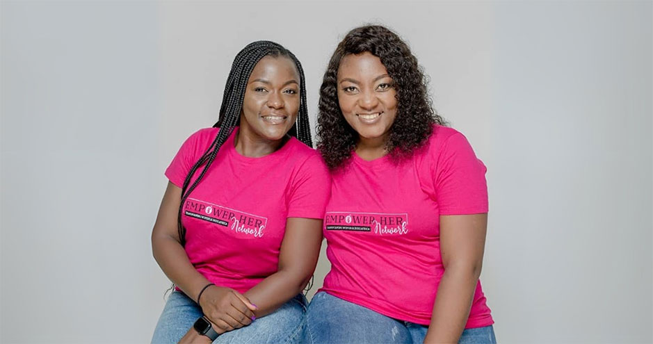 Helen Arrey and Leila Kigha, co-founders of Empower Network Africa, sitting side by side in pink T-shirts, smiling for a promotional photo.