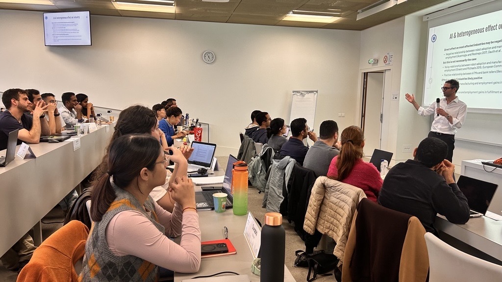 MBA students sitting in a classroom listening to a professor