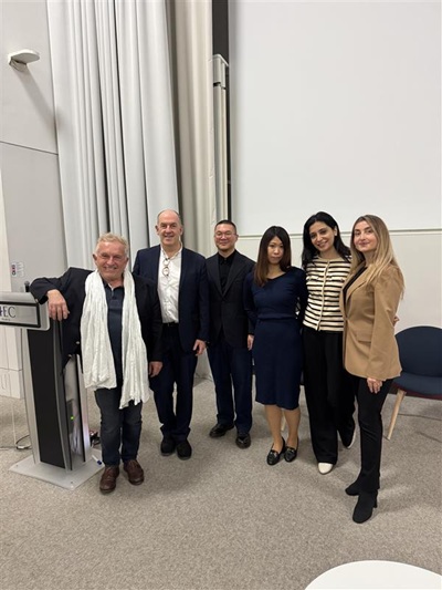 Professor Michel Safars and the HECEDA team pose for a group photo