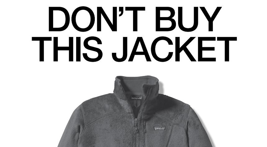 Advertisement for a jacket, with the text "DON'T BUY THIS JACKET" prominently displayed above a photograph of a gray, zip-up jacket