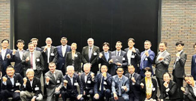 Group photo capturing everyone together in a unified celebratory moment