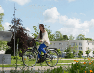 Girl on bike HEC Paris Square