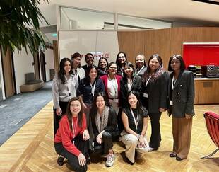 S25 MBA participants group photo at Bain Paris office