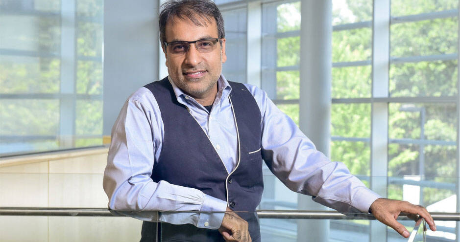Dr. Tayyab Rashid, expert in Positive Clinical Psychology and Faculty Affiliate at Harvard, pictured indoors on a university campus